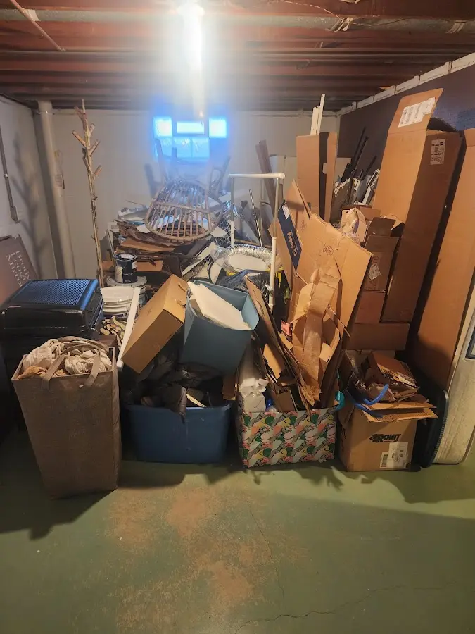 Roll-off dumpster container at job site for 8 Yard Dumpster Rental in Falls Church